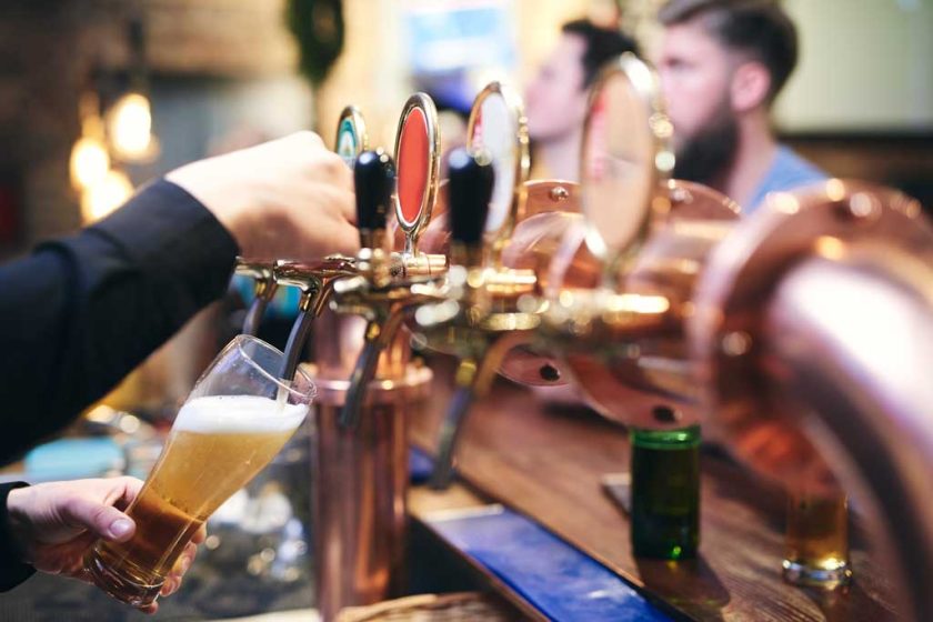 bartender-s-hand-pouring-customer